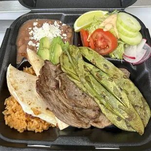 Asada special;rice,beans,salad,nopal,sm quesadilla,tortillas and a steak strip