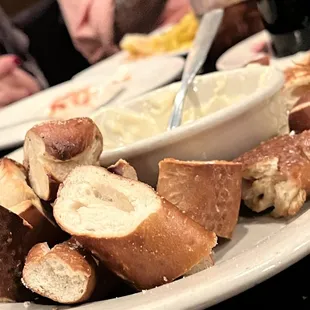 a plate of bread and dip