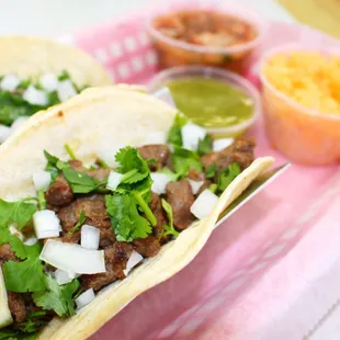 Carne Asada Street Tacos with a side of Traditional Rice, Beans and Salsa Verde!