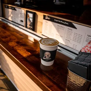 a cup of coffee on a counter