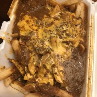 Large chili cheese fries, shredded cheese