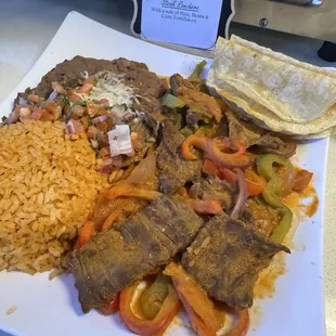 Steak Ranchero with a side of 4 corn tortillas