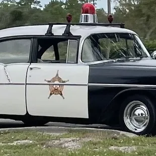 a police car parked in a parking lot