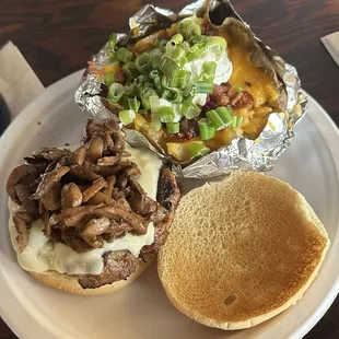 1/2 Lb . Beefburger with Swiss and Sauteed Mushrooms. Bake Potato loaded.