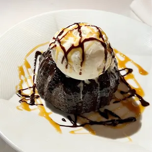 a dessert with ice cream and caramel