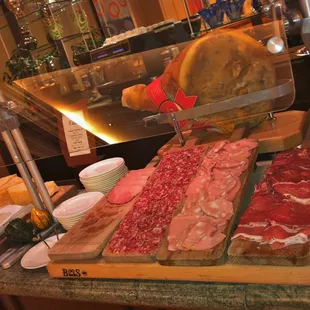 Breakfast sliced salami, ham and other cured meat selections