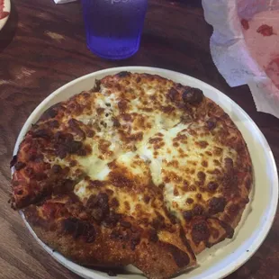 Personal sized pizza with beef and bacon