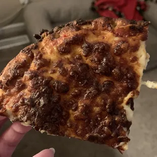 Burnt cheese on the pizza. :(