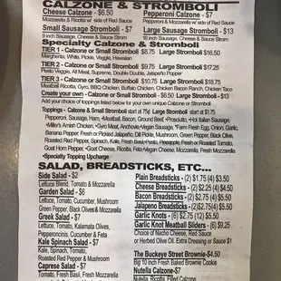 Oscar's menu on May 25, 2019.  We order a hand tossed 18 inch 1/2 Hawaiian and 1/2 sausage, pepperoni, and banana peppers.