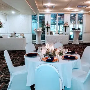 a banquet room set up for a wedding