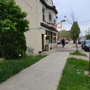 a person walking down the sidewalk