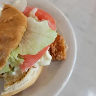 Fried flounder, thick piece, hangs off bun. Started eating it and remembered pic.