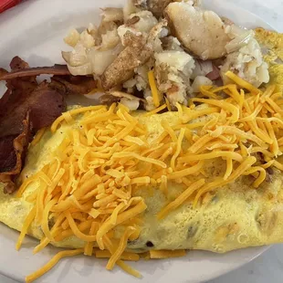 an omelet with bacon and cheese