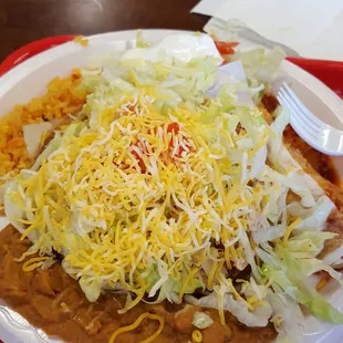 The #4 combo. A toastada and an enchilada (beef or chicken) with rice and beans. Includes a drink. With tax comes to $9.50. Very filling!