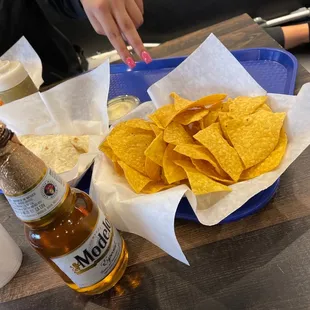 Burrito, chips and queso