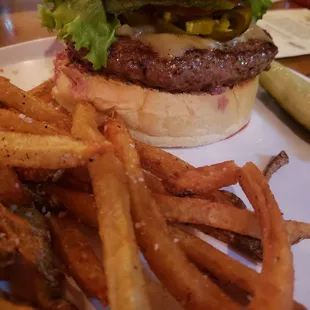 Build your own burger. I kept it simple: ghost pepper jack cheese, jalapeños, lettuce, tomato, and fried onions. So amazing.