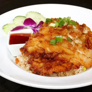 Crispy Chicken Fried Rice | Served over egg fried rice with sweet &amp; sour sauce.
