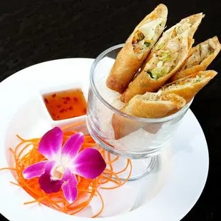 Vegetarian Crispy Rolls - Silver noodle, cabbage, shiitake mushrooms, and carrots with sweet and sour plum dipping sauce.    - Vegetarian