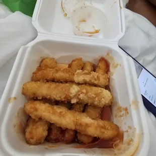 Calamari strips with sauce dumped everywhere