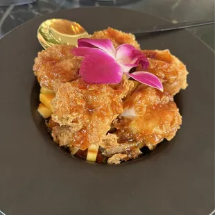 Fried prawns appetizer with mango salad