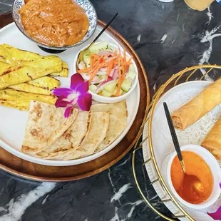 Chicken satay w/paratha and crispy spring rolls