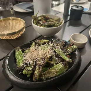 Shishito peppers with mushrooms under