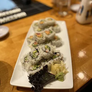 a plate of sushi on a table