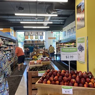 people shopping in a grocery store