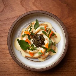 Honey cake with smoked caviar and green garlic from the Late Harvest menu experience