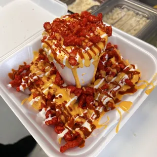 elote chorreado with hot cheetos