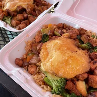 two take out containers of food