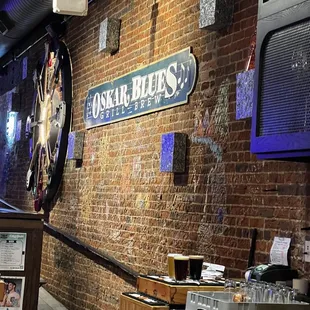 a brick wall with a clock on it