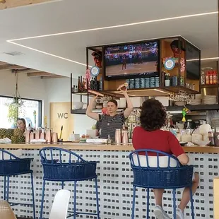 Bar area , drinks in coconuts or pineapple