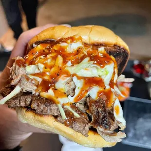 The Farmer smash burger w/ pulled pork and coleslaw