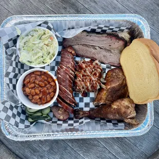 Prime brisket, pulled pork, chicken quarter, jalapeño cheddar sausage, bbq beans w/ bacon, smoked mac