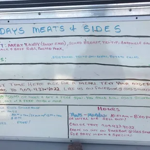 a white board with a list of food items on it