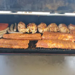 Slow smoked baby back ribs, chicken,  jalapeno cheddar sausage.