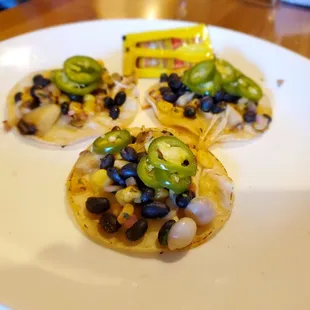 three tacos on a plate