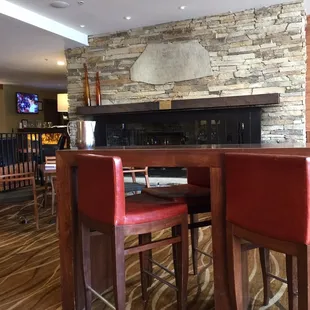 bar with red chairs