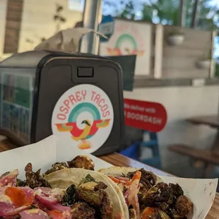 Brussels sprouts tacos.  Very, very good.  If you like sprouts, you'll like these tacos.  I think a bowl would. E excellent