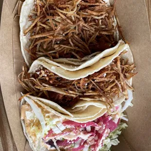 Two chorizo and one avocado taco