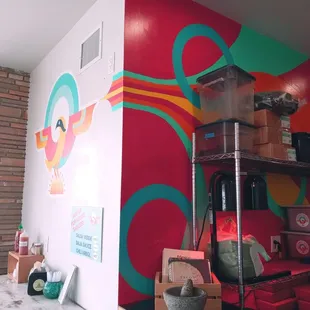 a room with a colorful wall