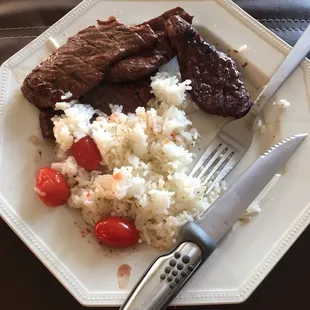 a plate of rice and vegetables
