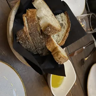 a plate of bread and dipping sauce