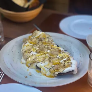 Ricotta Sourdough Toast with Truffle and honey drizzle (special)