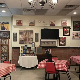 Dining room with table of homemade sauce for sale
