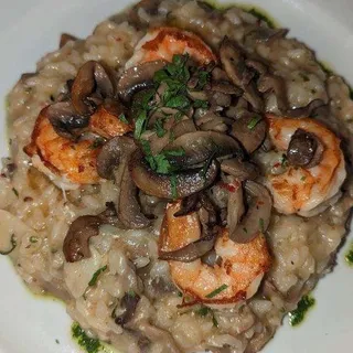 Risotto con capesante e funghi
