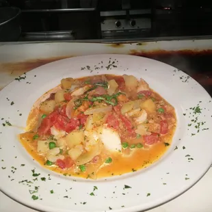 Bacala. Cod  potatoes  peas. Chefs traditional homemade recipe