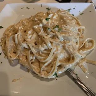 Fettuccine Alfredo with crab meat and old bay seasoning