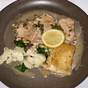 Veal piccata with lemon caper sauce, augratin potatoes and cauliflower.